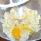 adding eggs to shortening and sugar