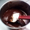 melted chocolate mixture for gluten free rocky road bars.