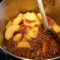 adding peaches to hot caramel for gluten free upside down cake