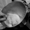 hand whipping egg whites for meringue