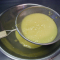strain the cooked, thickened curd